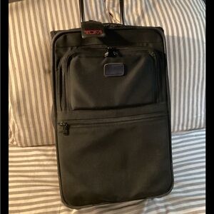 Tumi 20” rolling luggage